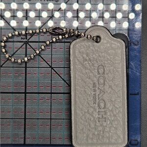 Coach Silver Leather Bag Tag
